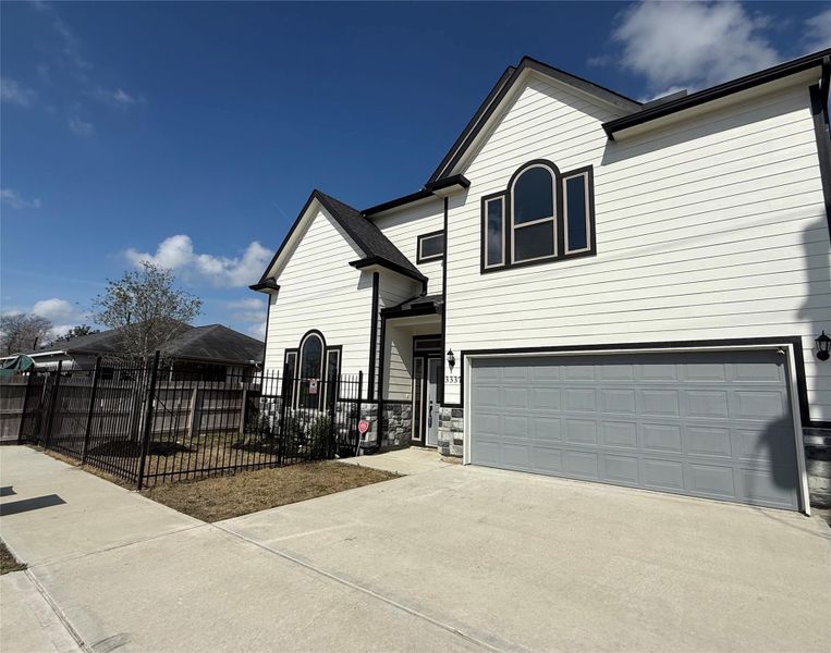 Front exterior of a new home in , Houston, TX, highlighting curb appeal (Image 18).