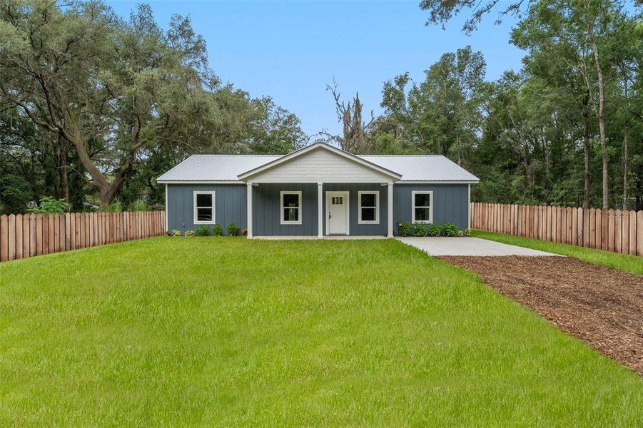 Exterior details and patio area of a home in , Florahome (Image 28).