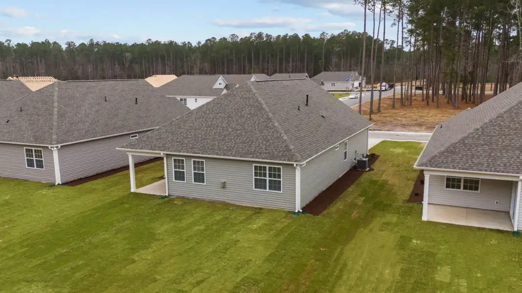 Exterior details and patio area of a home in Chambray, New Bern (Image 3).