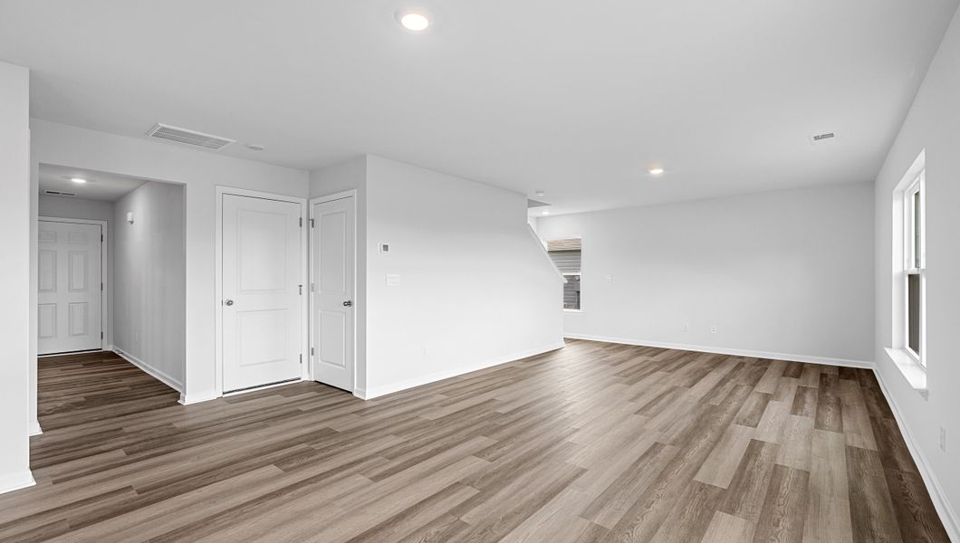 Spacious, unfurnished interior of a new home in Bentley Park, Greenwood (Image 23).