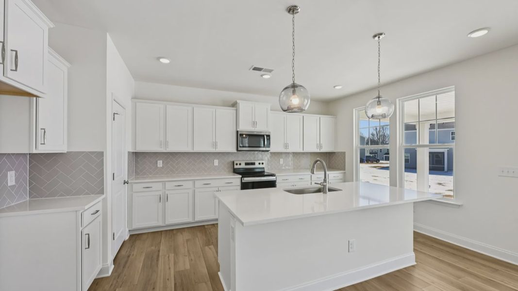 Furnished interior view inside a new home in Sidney Creek Single Family, Zebulon (Image 16).