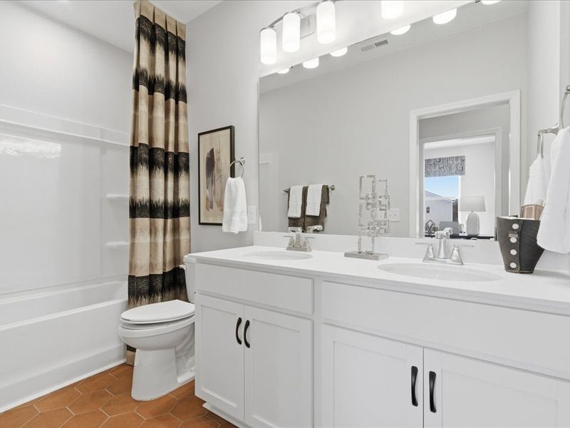 Representative furnished interior of a home built from the Avett by Tri Pointe Homes in Ellis Townes, Charlotte (Image 31).