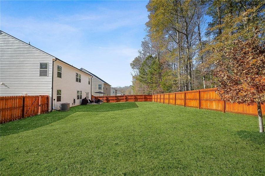 Exterior details and patio area of a home in The Greens at Thompson Creek, Hampton (Image 3).