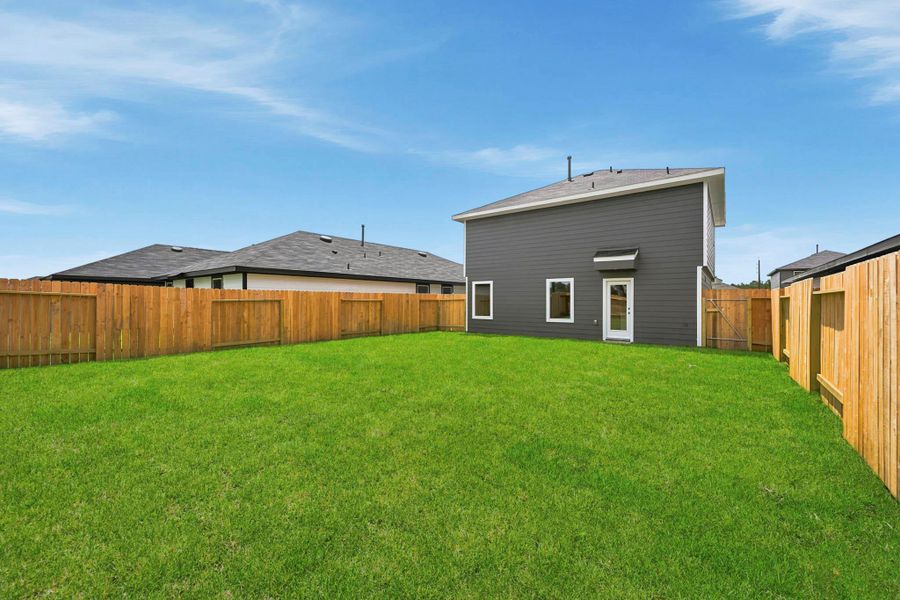 Exterior details and patio area of a home in Sunset Valley, Hockley (Image 17).