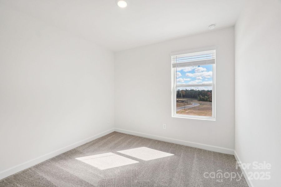 Spacious, unfurnished interior of a new home in Meadows at Wilson Farms - The Heights Series, Fort Mill (Image 19). Spacious, unfurnished interior of a new home in Meadows at Wilson Farms - The Heights Series, Fort Mill (Image 19).