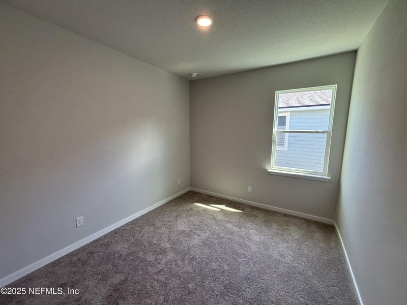 Spacious, unfurnished interior of a new home in The Magnolia Series at Reserve East, Flagler Beach (Image 23).