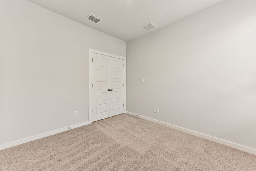 A room with white doors.