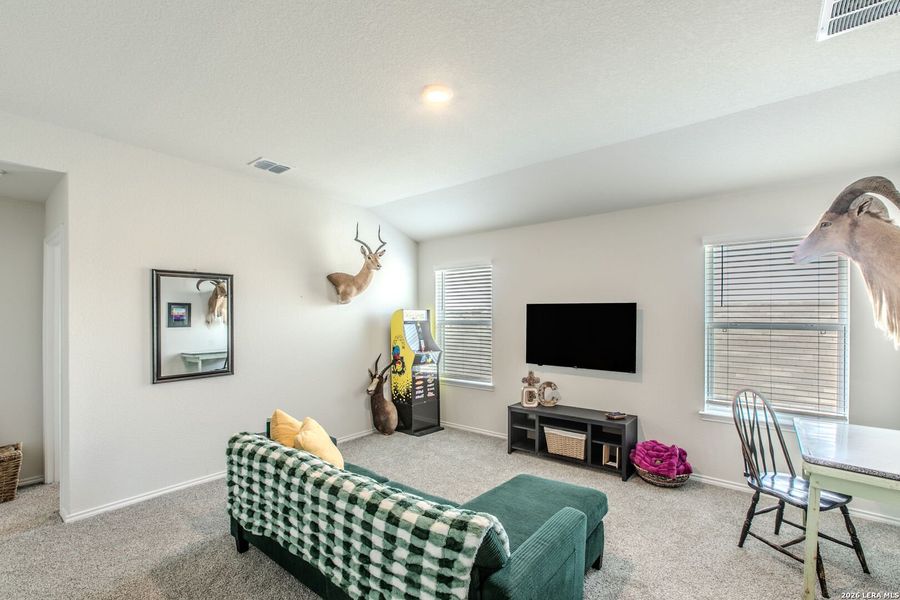 Furnished interior view inside a new home in The Links at River Bend, Floresville (Image 13).