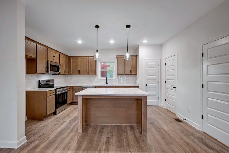 Representative furnished interior of a home built from the Ingram Rowhome by Parkside Builders in Anderson Park, Hendersonville (Image 33).