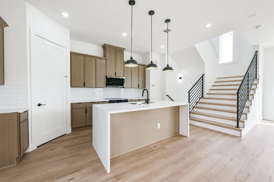 Walk in pantry is located in the corner of the kitchen.