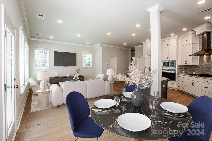 Great Room, Dining Area & Kitchen.  Virtually staged.