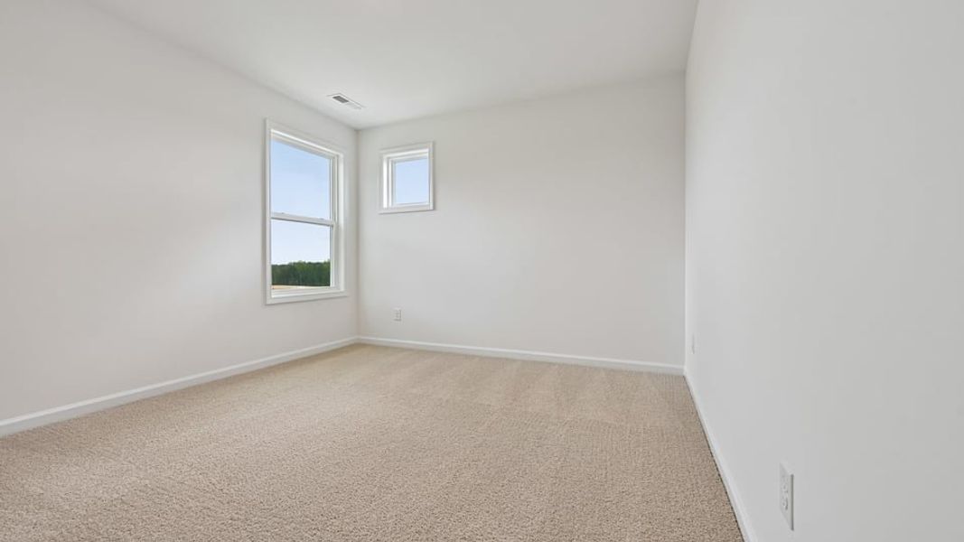 Representative unfurnished interior of a home built from the Summit by D.R. Horton in Kalas Falls, Wake Forest (Image 35).