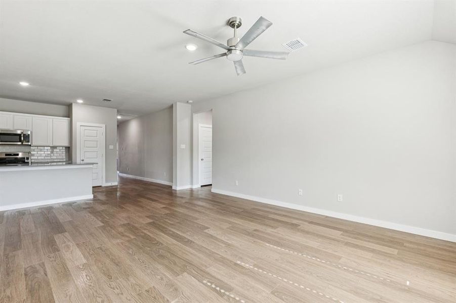 Living Room in the Heisman home plan by Trophy Signature Homes – REPRESENTATIVE PHOTO Living Room in the Heisman home plan by Trophy Signature Homes – REPRESENTATIVE PHOTO