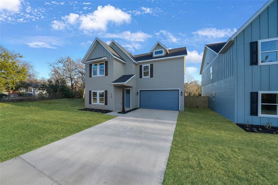 Front exterior of a new home in , Waxahachie, TX, highlighting curb appeal (Image 21).