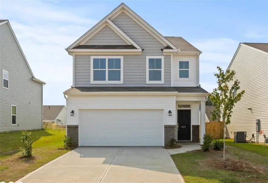 Front exterior of a new home in Villas at Dawsonville, Dawsonville, GA, highlighting curb appeal (Image 1). Front exterior of a new home in Villas at Dawsonville, Dawsonville, GA, highlighting curb appeal (Image 1).