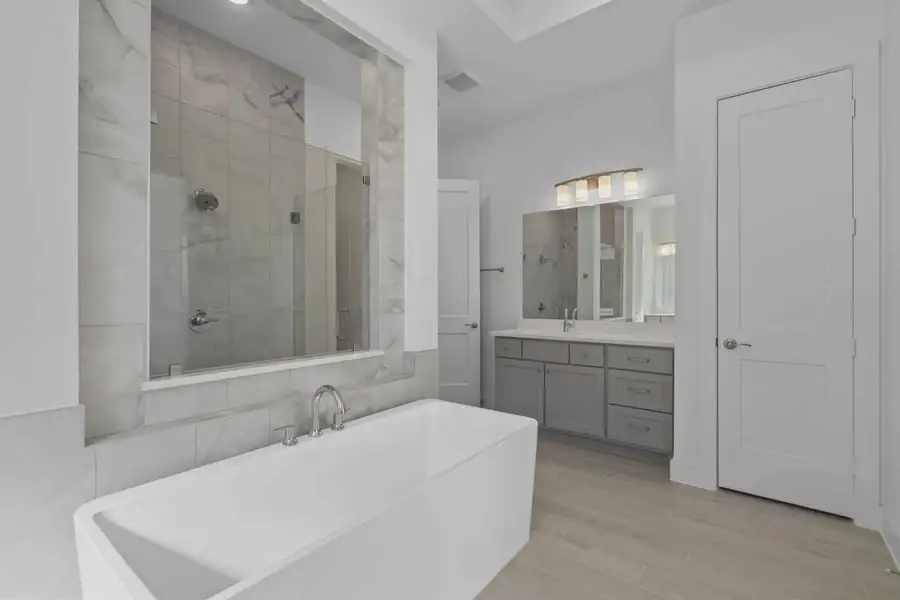 Representative furnished interior of a home built from the Waterford by Chesmar Homes in Meridiana 60's, Manvel (Image 6).