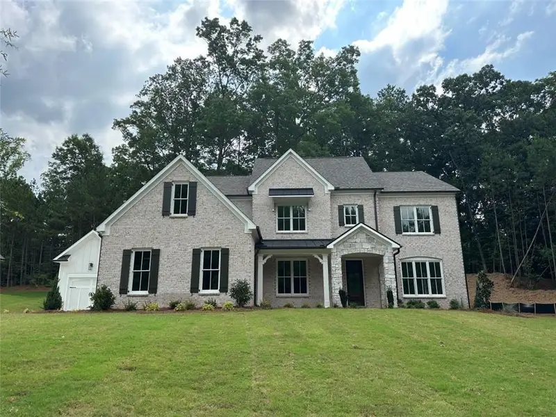 Front exterior of a new home in Lanesborough, Marietta, GA, highlighting curb appeal (Image 11). Front exterior of a new home in Lanesborough, Marietta, GA, highlighting curb appeal (Image 11).