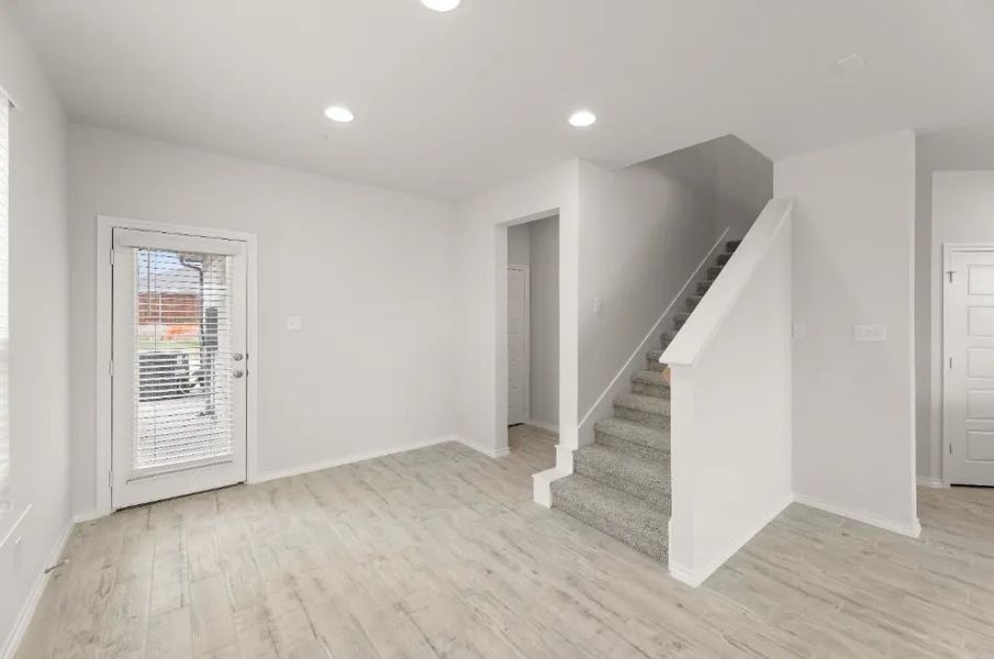 Front exterior of a new home in Sanger Circle, Sanger, TX, highlighting curb appeal (Image 10).