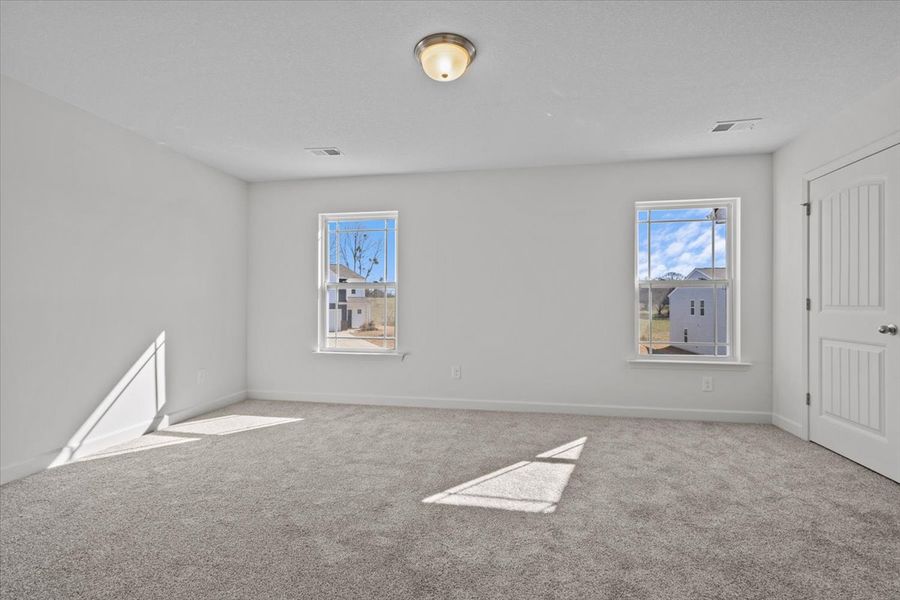 Representative unfurnished interior of a home built from the Roebuck by Enchanted Homes in Las Palomas Country Club Estates, La Vernia (Image 19).