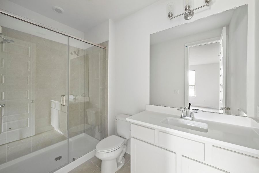 Furnished interior view inside a new home in Flora - 60', Hutto (Image 13).