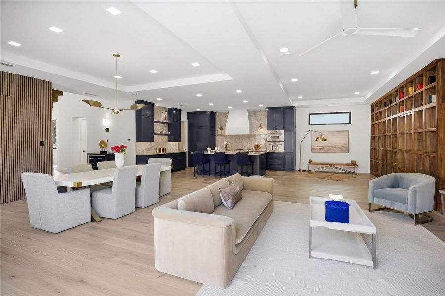 Designed for both grand entertaining and intimate moments, this expansive living area blends scale, texture, and natural light with effortless sophistication.