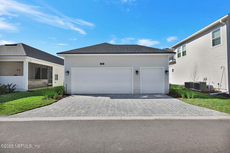 Front exterior of a new home in , Ponte Vedra, FL, highlighting curb appeal (Image 23).