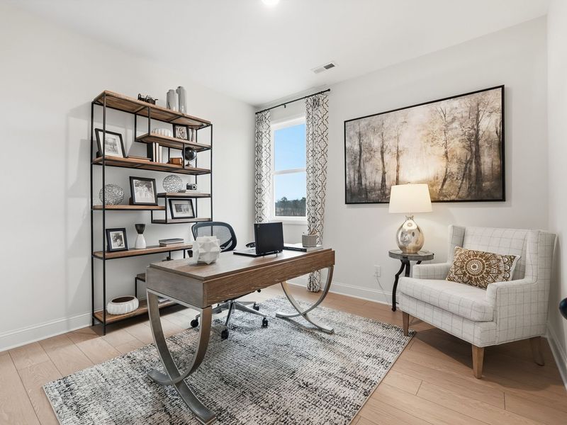 Representative furnished interior of a home built from the The Laurel J by Davidson Homes LLC in Bailey Park, Fayetteville (Image 16).