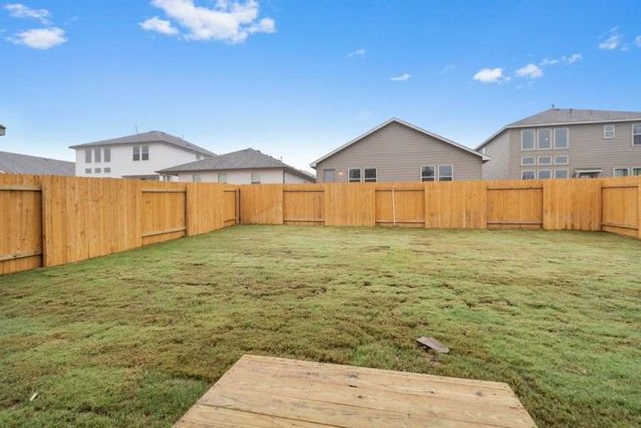 Front exterior of a new home in Morningstar, Georgetown, TX, highlighting curb appeal (Image 7).