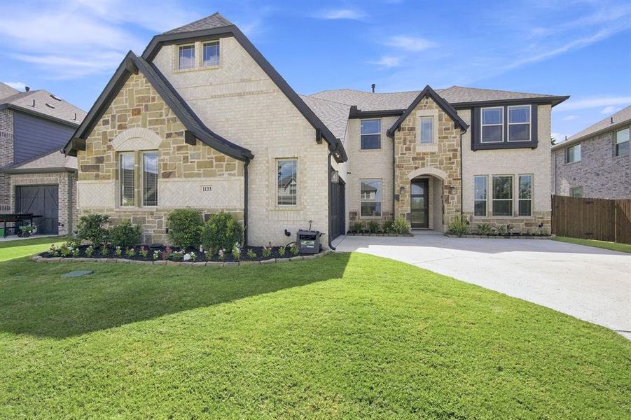 Front exterior of a new home in , Midlothian, TX, highlighting curb appeal (Image 21). Front exterior of a new home in , Midlothian, TX, highlighting curb appeal (Image 21).