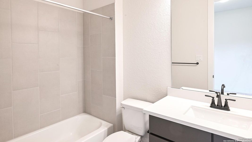 Furnished interior view inside a new home in Cibolo Valley Heights 65', Cibolo (Image 12).