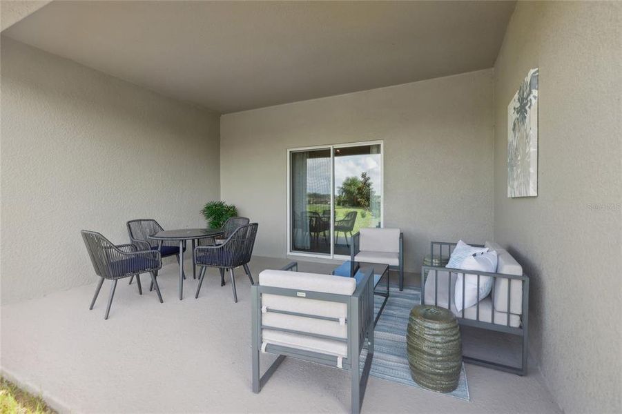 Exterior details and patio area of a home in Groves at Grand Island, Grand Island (Image 3).