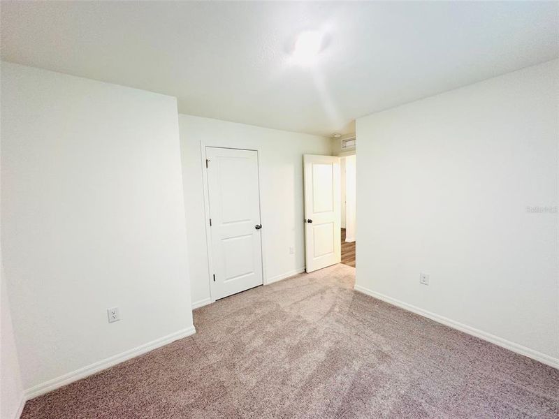 Spacious, unfurnished interior of a new home in , Port Charlotte (Image 17).