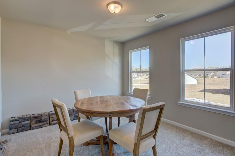 Furnished interior view inside a new home in Sutton's Landing, Statham (Image 17).
