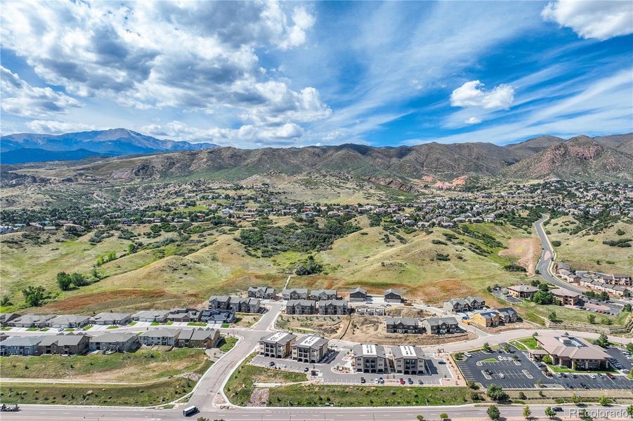 Enjoy your home nestled into the 78-acre Mountain Shadows Open Space, minutes from the mountains and right across from Ute Valley Park.