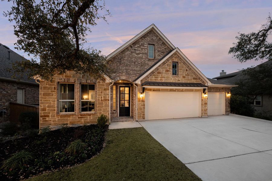 Representative exterior photo of a completed home built from the Alexander II by Ashton Woods in Sunday Creek at Kinder Ranch, San Antonio, TX (Image 1).