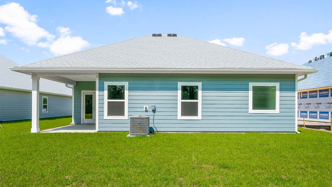 Representative exterior photo of a completed home built from the The Kennedy by D.R. Horton in Buffer Farms, Port Saint Joe, FL (Image 17).
