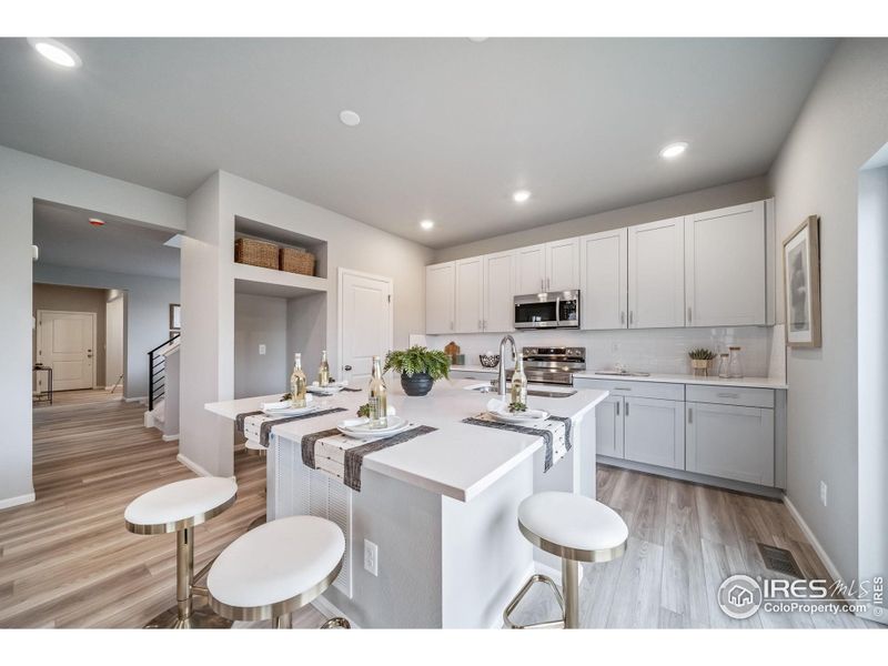Furnished interior view inside a new home in Thompson River Ranch, Johnstown (Image 43).