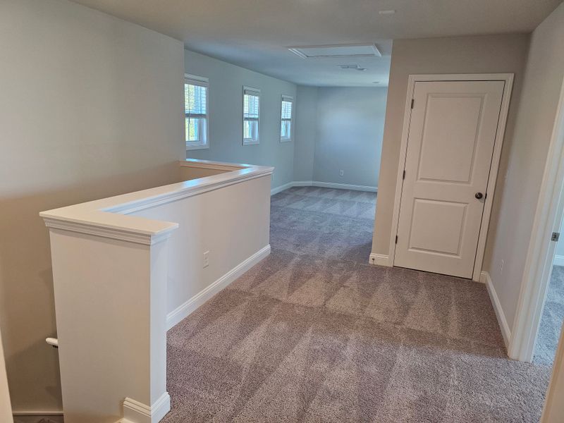 Spacious, unfurnished interior of a new home in Solserra, Shallotte (Image 14).