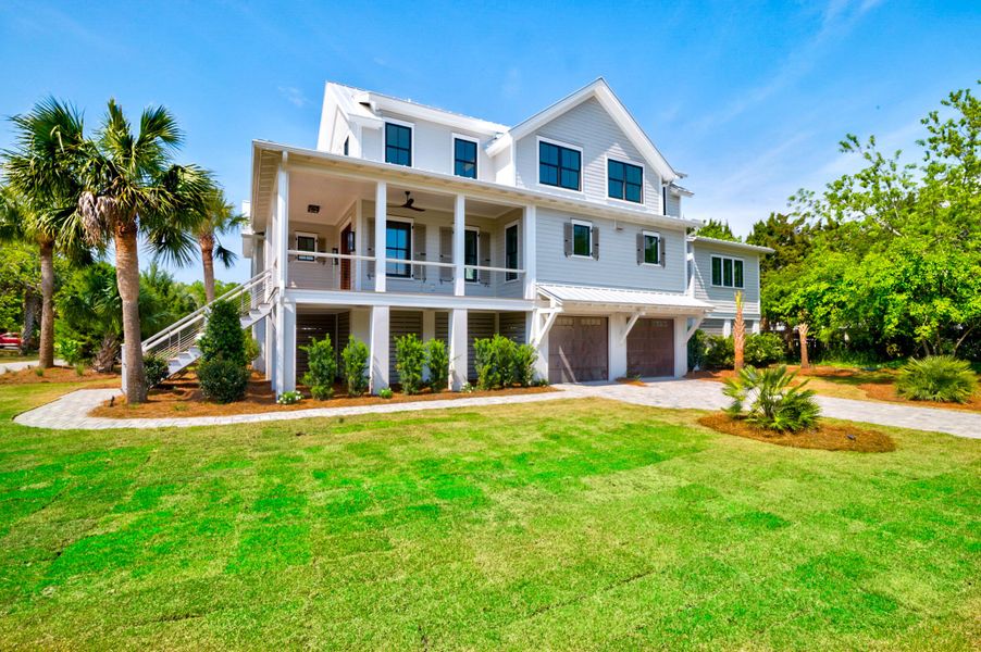Front exterior of a new home in , Sullivan's Island, SC, highlighting curb appeal (Image 27).