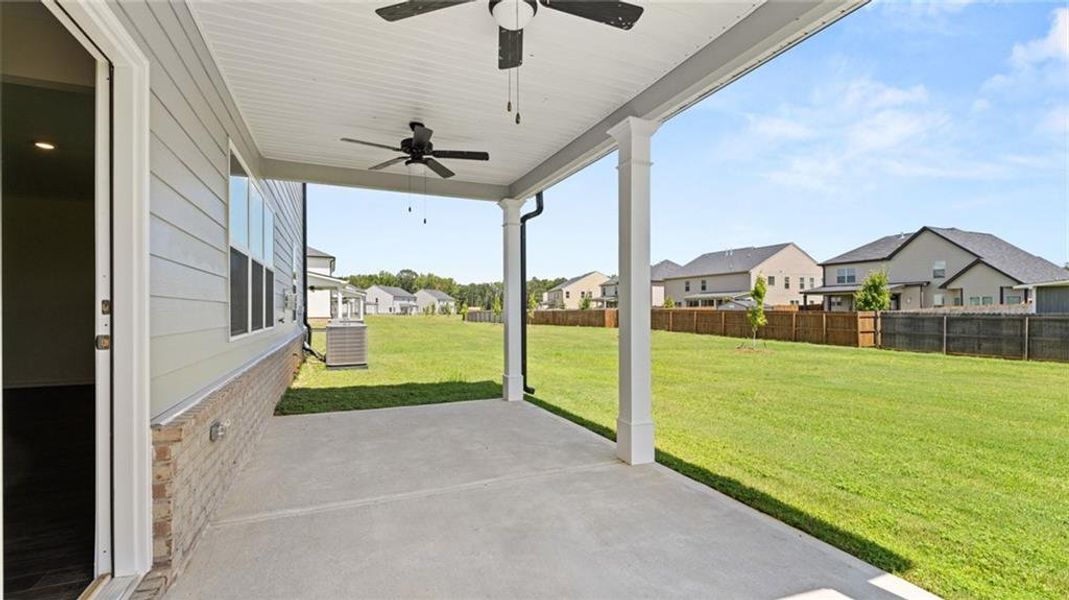 Front exterior of a new home in Bridle Creek, Locust Grove, GA, highlighting curb appeal (Image 22).