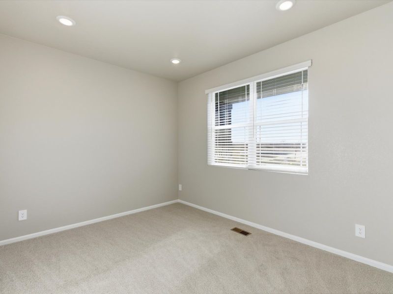 Spacious, unfurnished interior of a new home in Buffalo Highlands: The Canyon Collection, Commerce City (Image 18).
