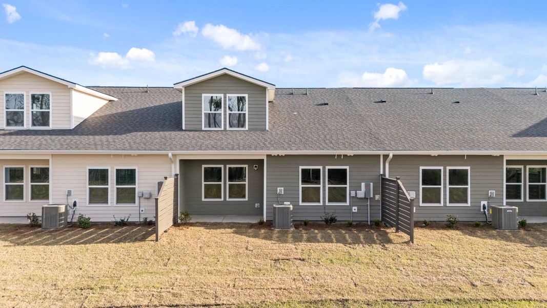 Exterior details and patio area of a home in Blue Heron Retreat, Little River (Image 3).