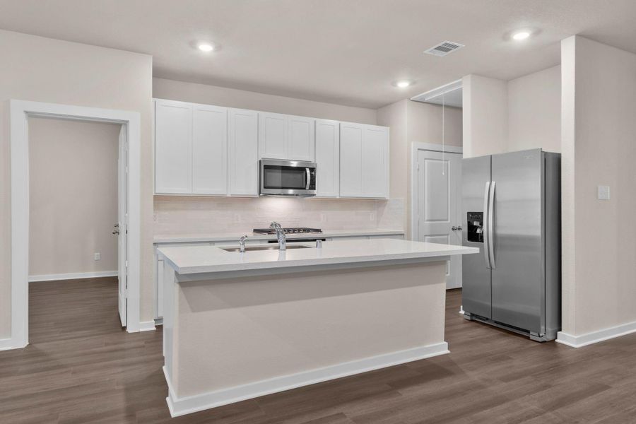 Furnished interior view inside a new home in Westridge Cove 50', Panorama Village (Image 7).