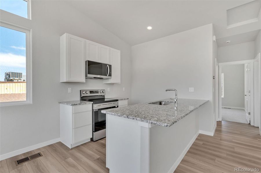 Furnished interior view inside a new home in , Monument (Image 9).