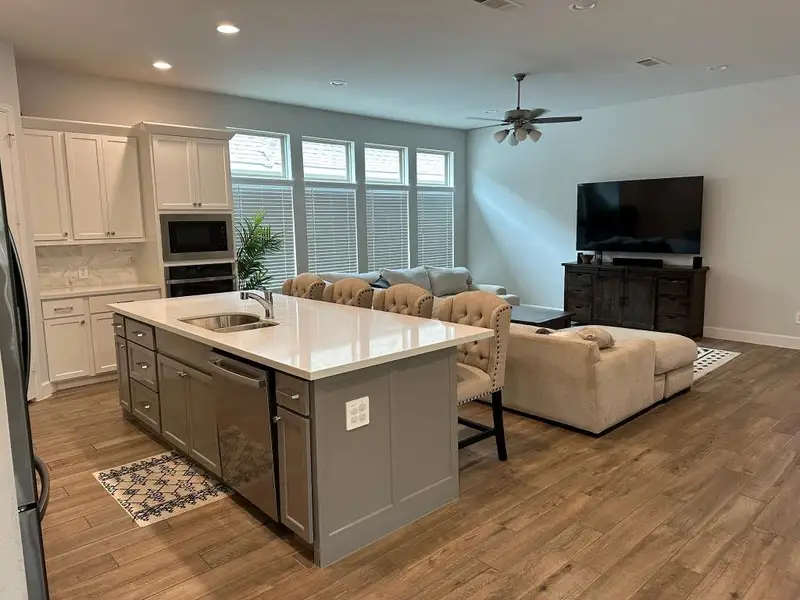 Furnished interior view inside a new home in Grand Central Park 45', Conroe (Image 3).