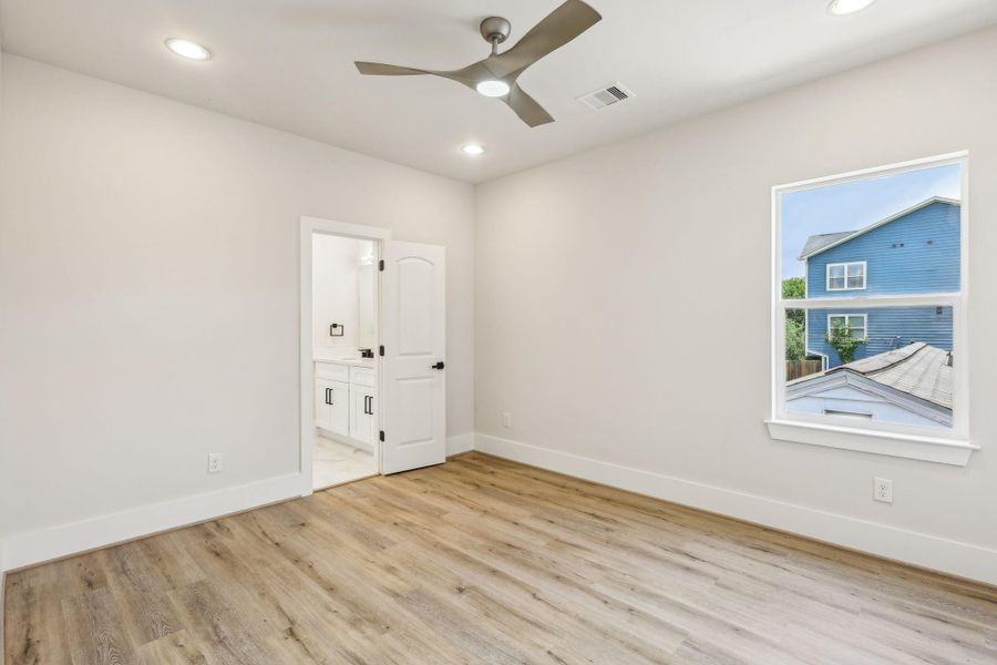 Second bedroom with ceiling fan