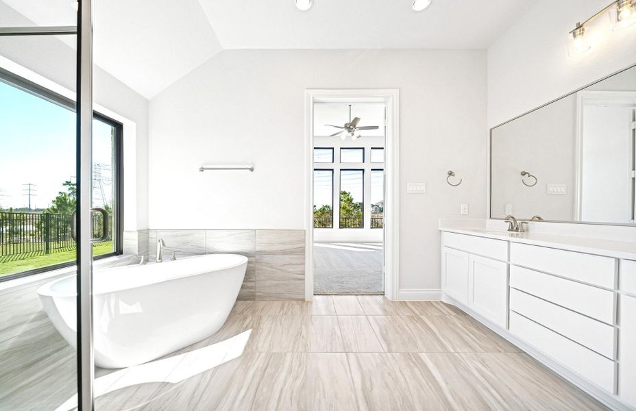 Furnished interior view inside a new home in Bridgeland 60′, Cypress (Image 11).