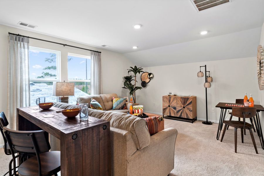Representative furnished interior of a home built from the The Cherry Grove by Chesapeake Homes in Coastal Club of the Carolinas, Calabash (Image 7).