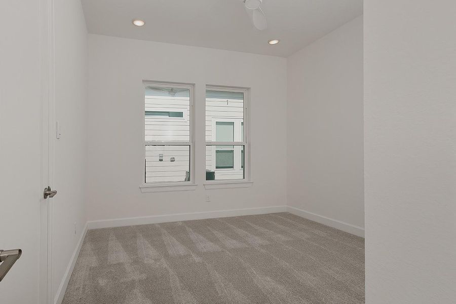 Spacious, unfurnished interior of a new home in Lake Breeze, Willis (Image 34).