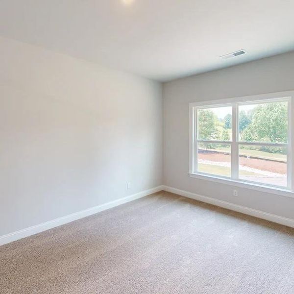 Spacious, unfurnished interior of a new home in Mirror Lake at South Harbour, Villa Rica (Image 16).